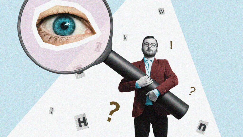 homem segura uma lupa gigante dentro da qual aparece um olho
