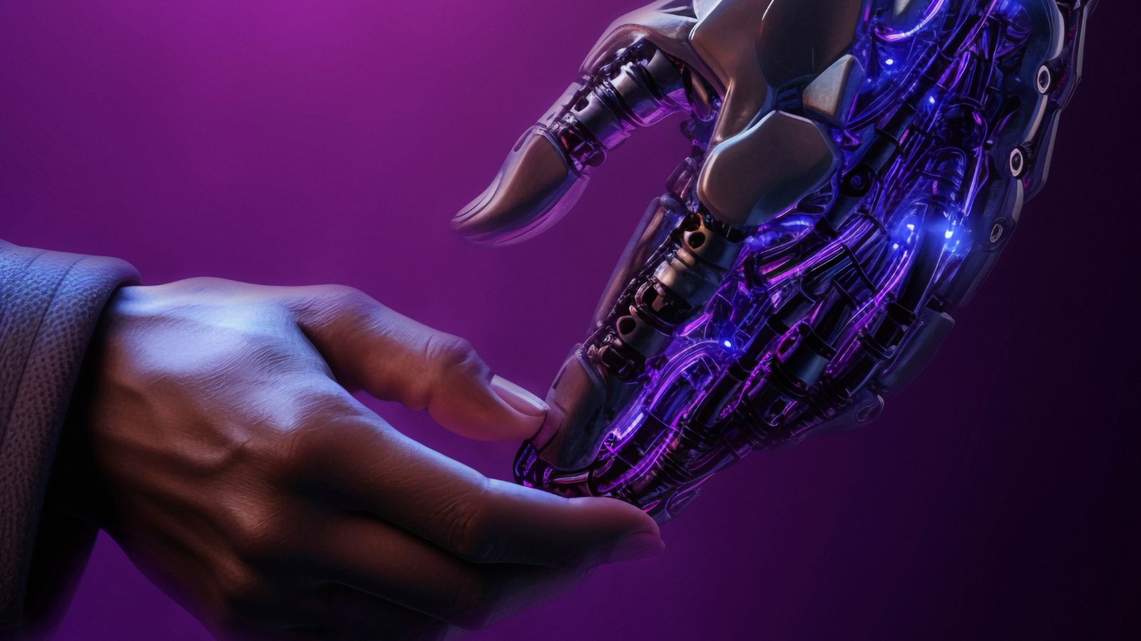 Mão de humano e robô se tocando