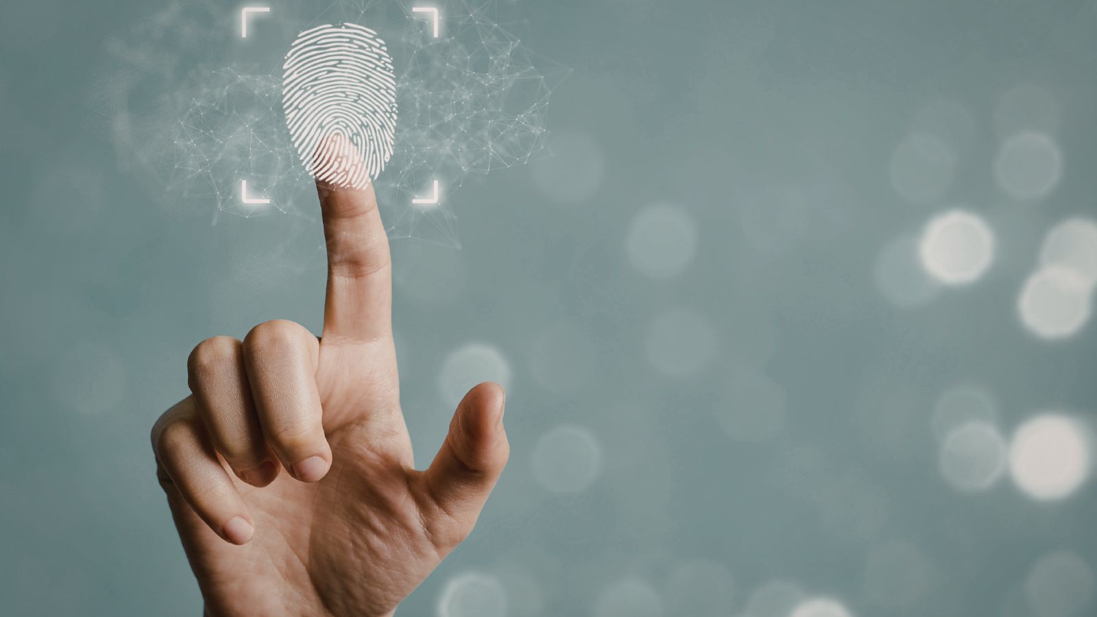 Dedo indicador colocando a biometria.
