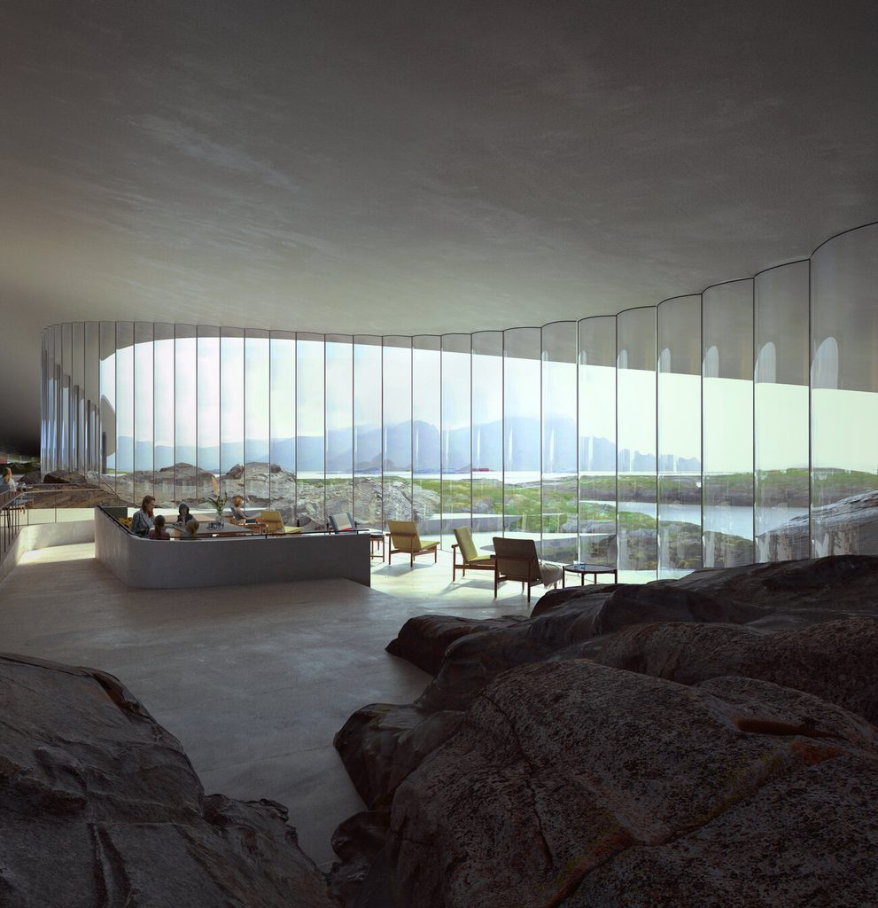 Interior do The Whale com paredes de vidro, rochas e vista para a paisagem costeira da Noruega
