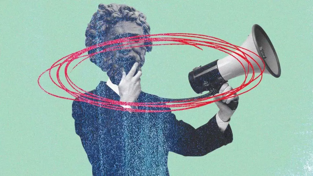 homem com cabe&ccedil;a de est&aacute;tua segura um megafone