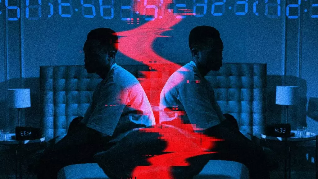 pessoa sentada na cama sofre com insônia