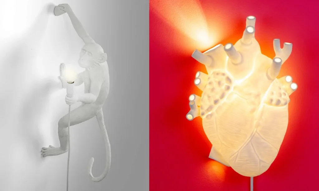 lumin&aacute;rias em forma de macaco e de cora&ccedil;&atilde;o da marca Seletti