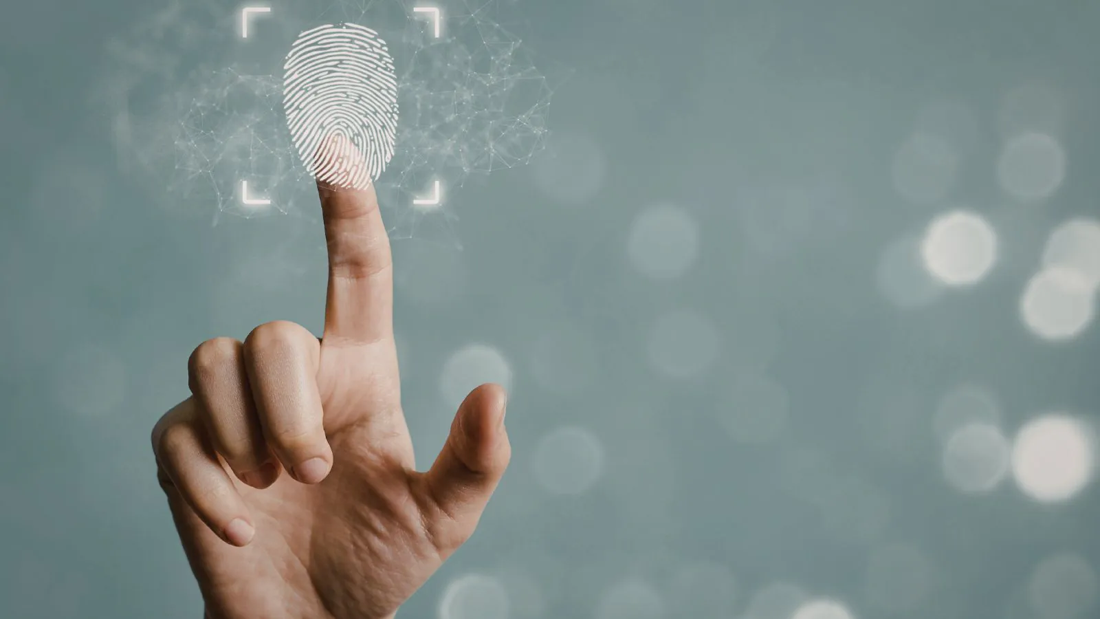 Dedo indicador colocando a biometria.