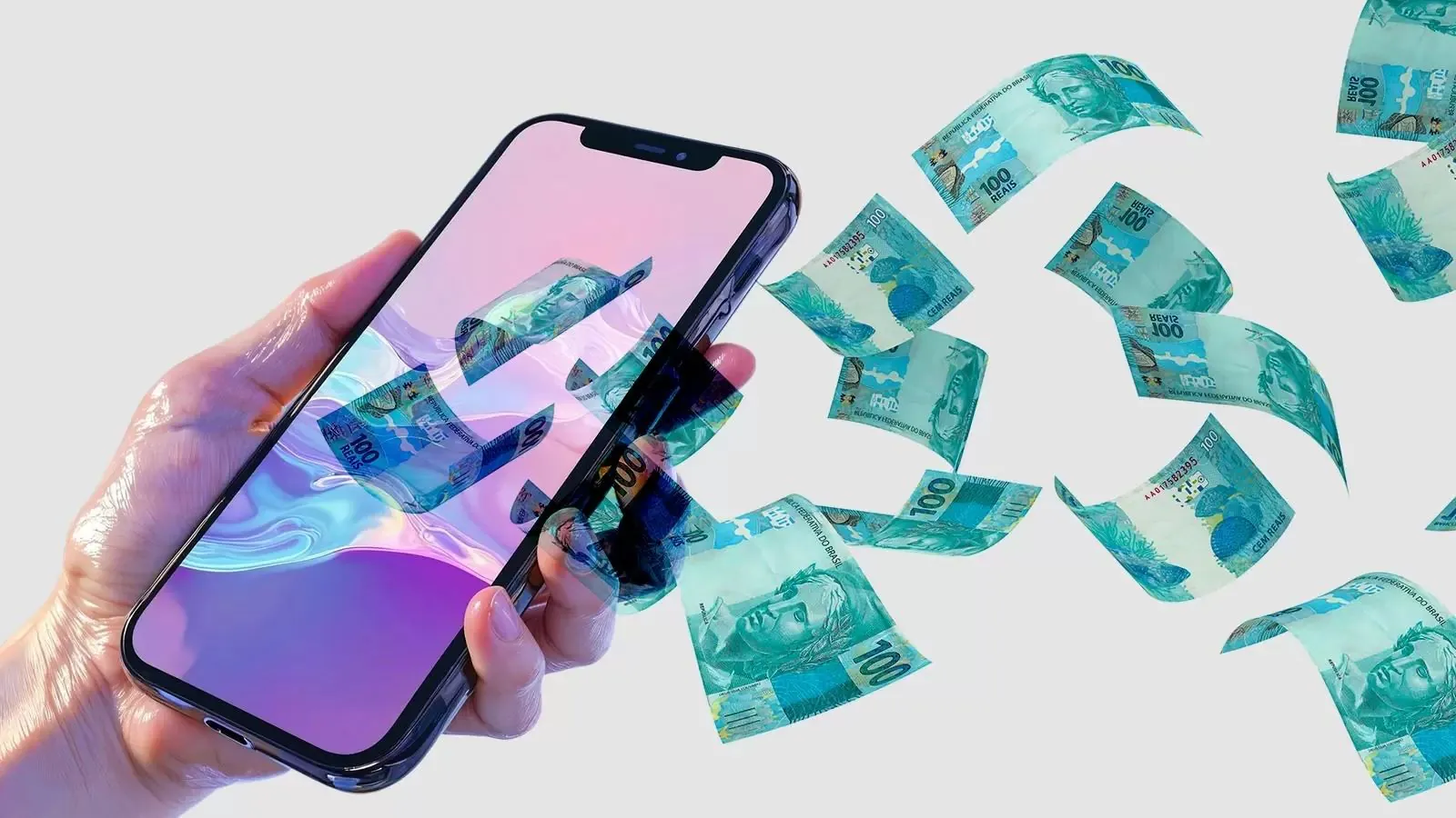 Uma mão segurando um celular de onde saem cédulas de real